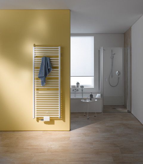 Grzejnik łazienkowy Geneo-Circle 677 W 730 x 1190 x 40 mm RAL 9016 biały przyłącze dolne 50 mm | GCN1M1200752XXK